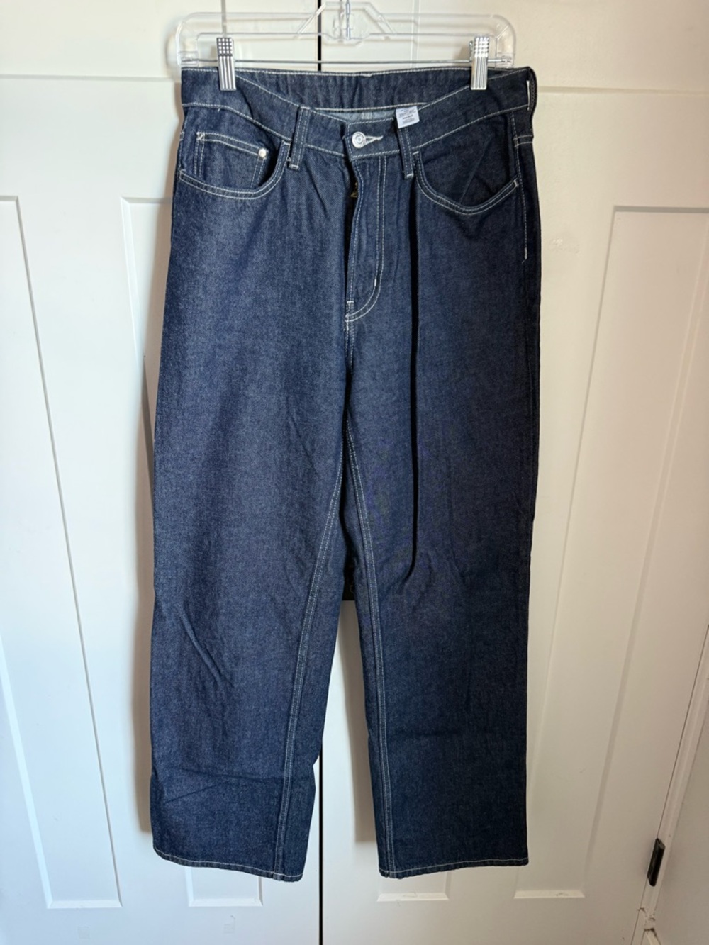 NWOT H&M high rise wide leg jeans in a dark wash color way. Size 8.
